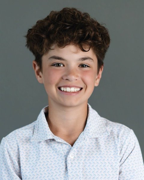 school portrait of a boy with curly hair, Denver Colorado