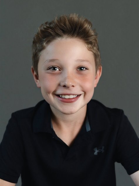 school portrait of a boy in a navy polo in Parker, Colorado